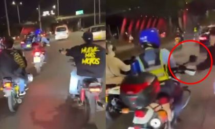 Video: agreden a agente de tránsito que intentó parar caravana de motociclistas