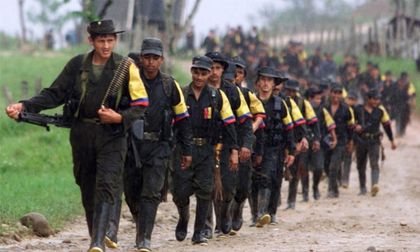 Imagen de  Guerrilleros en camino a zonas de desarme sin terminar